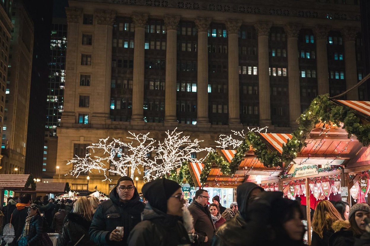 Christkindlmarket wooden booths and lights at Daley Plaza in Chicago