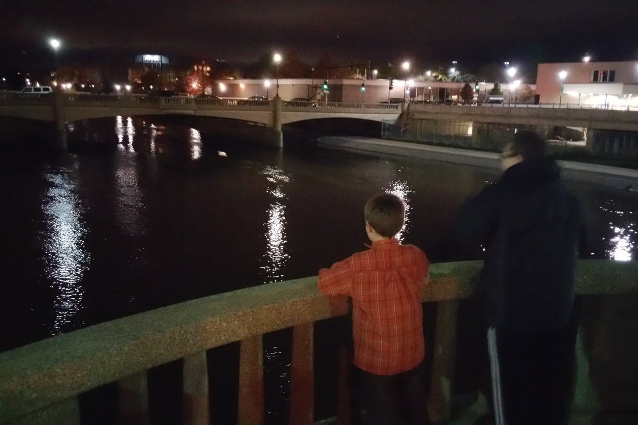 The Fox River flowing through multiple towns with historic bridges and low mill dams visible