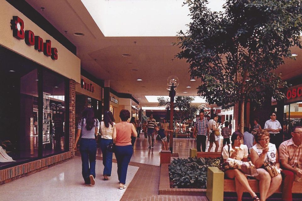 Shoppers on the Lincoln Mall concourse by Bonds in the 1970s